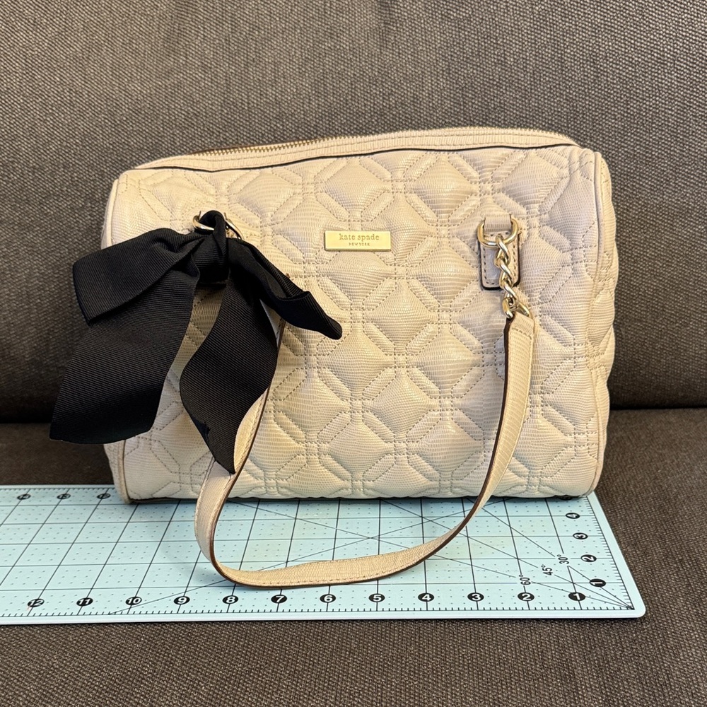 Kate Spade Beige Quilted Crossbody Bag with Black Bow